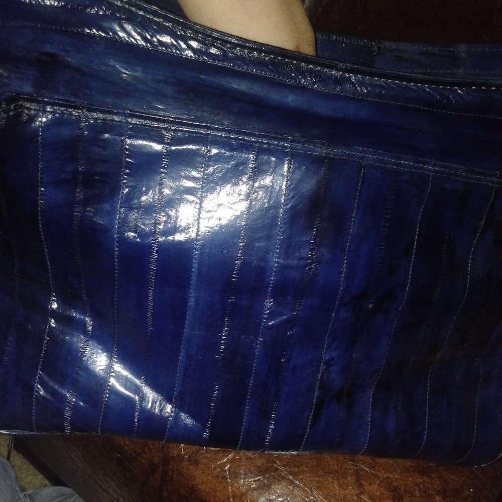 Lee Sands eel skin purse